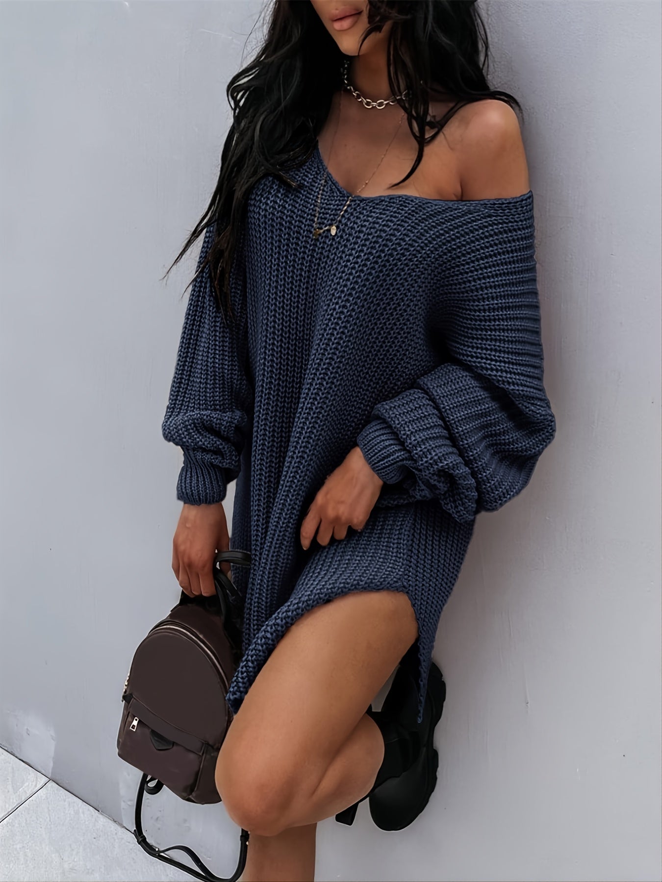 Knitted sweater with V-neck and lantern sleeves