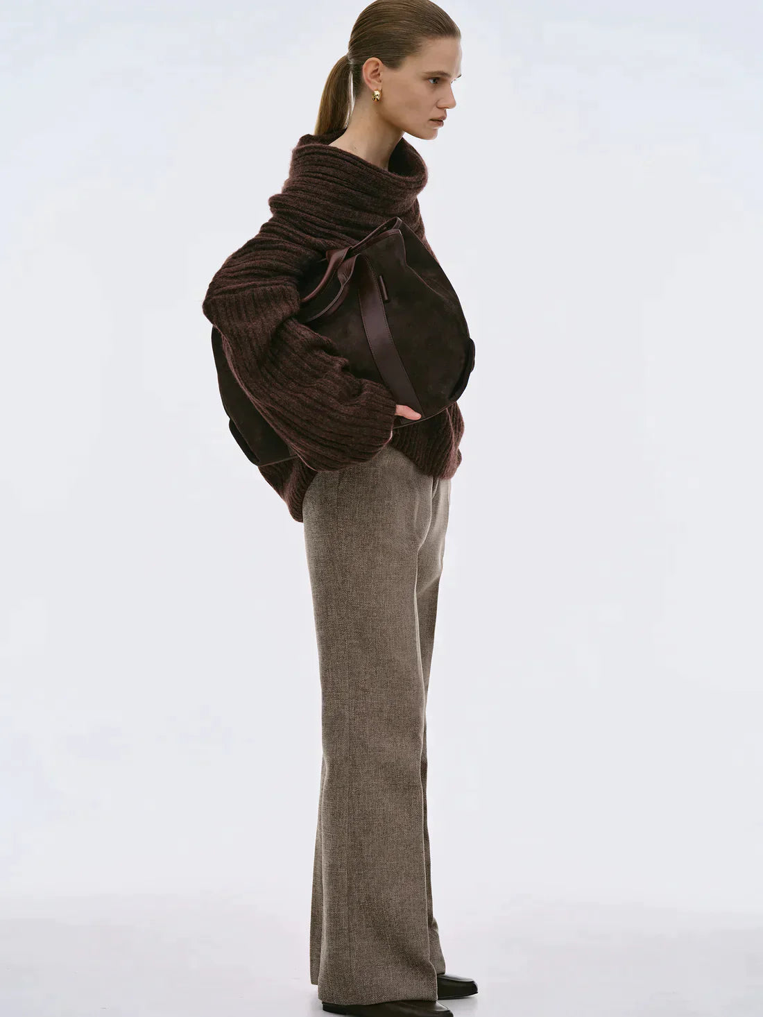 Oversized knitted sweater with high roll