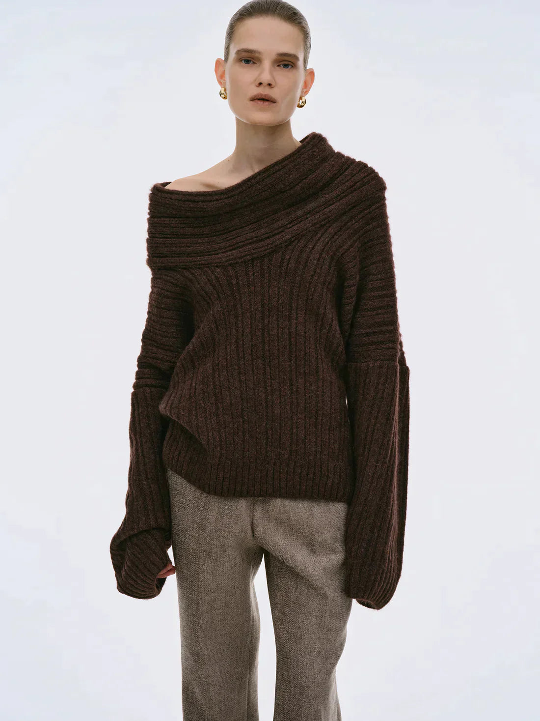 Oversized knitted sweater with high roll