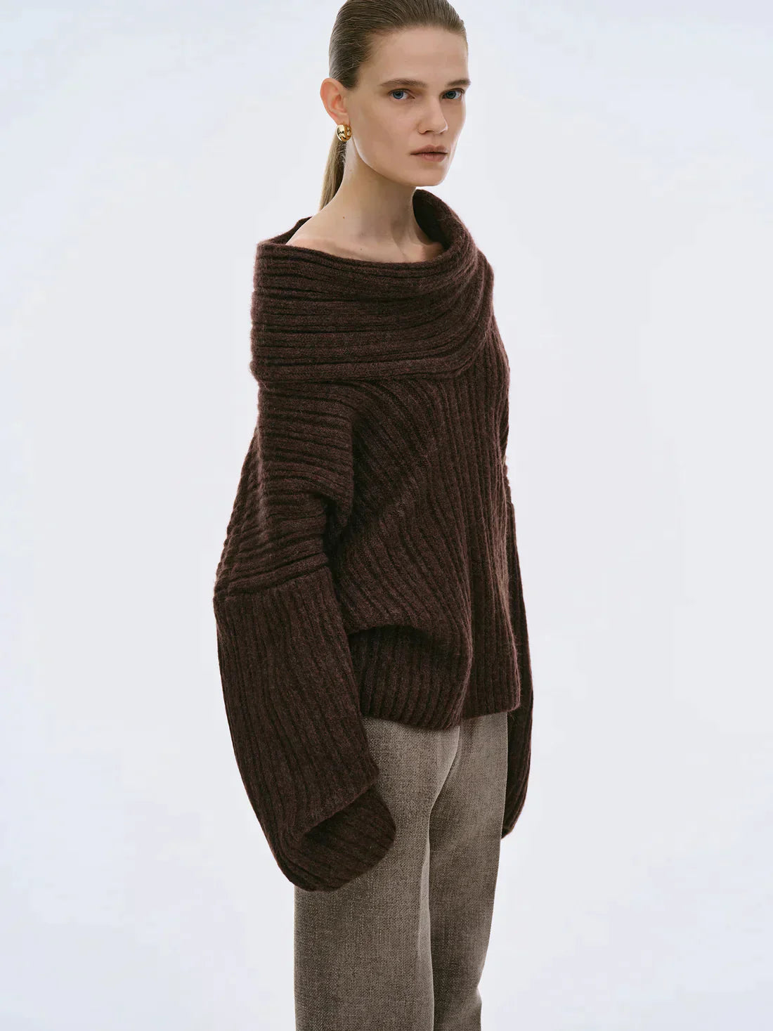 Oversized knitted sweater with high roll