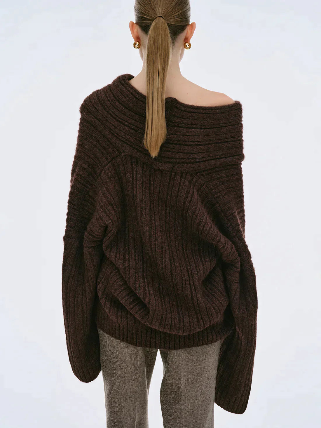 Oversized knitted sweater with high roll