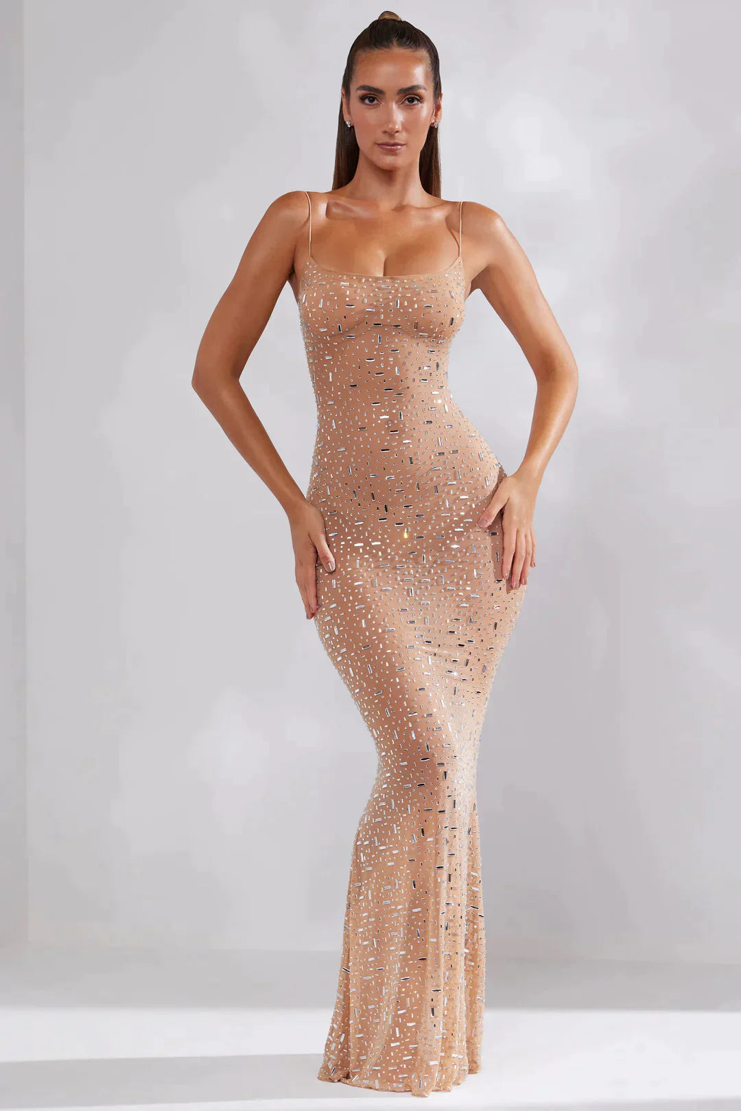 Transparent decorated evening dress with round neckline in almond