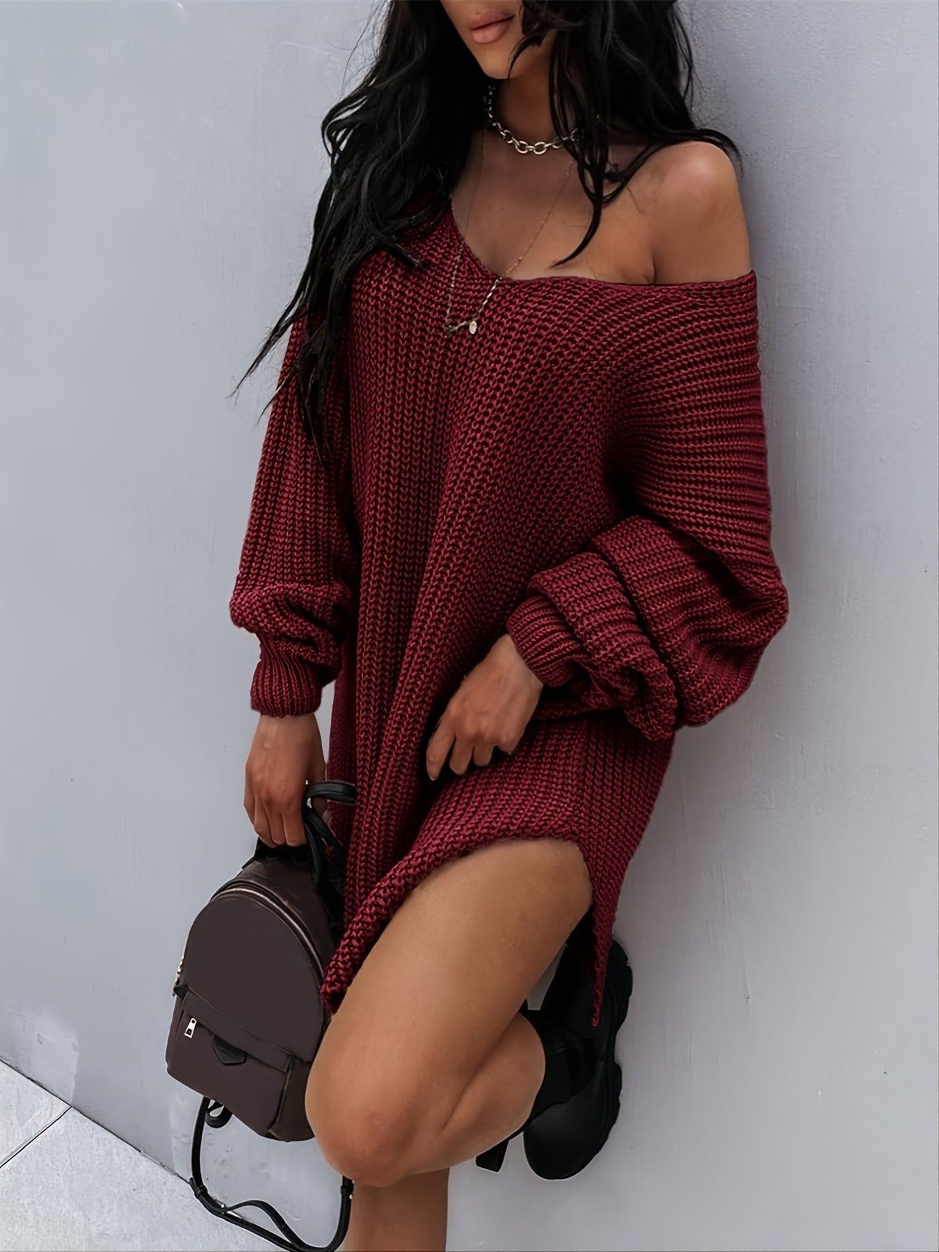 Knitted sweater with V-neck and lantern sleeves