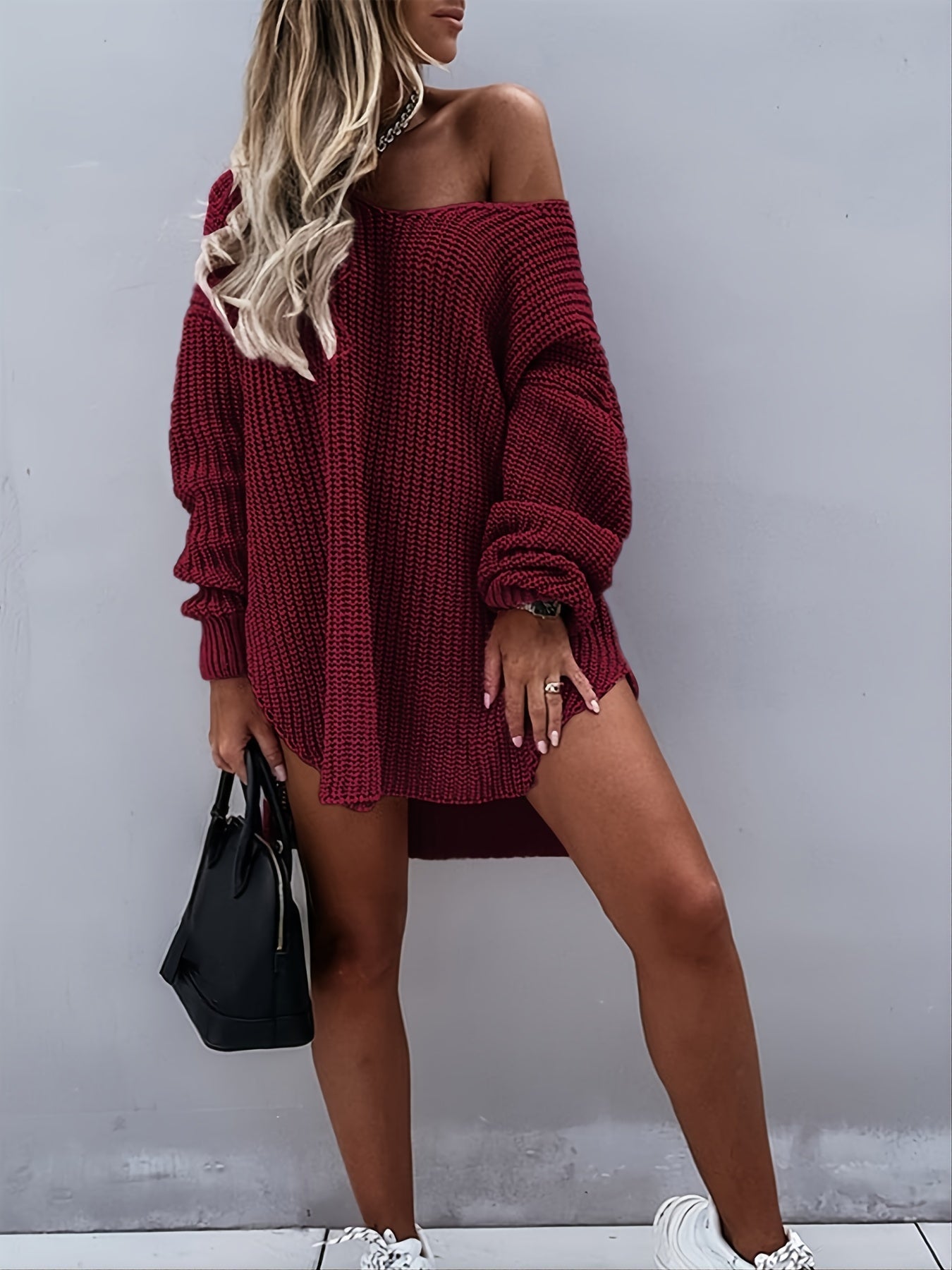 Knitted sweater with V-neck and lantern sleeves