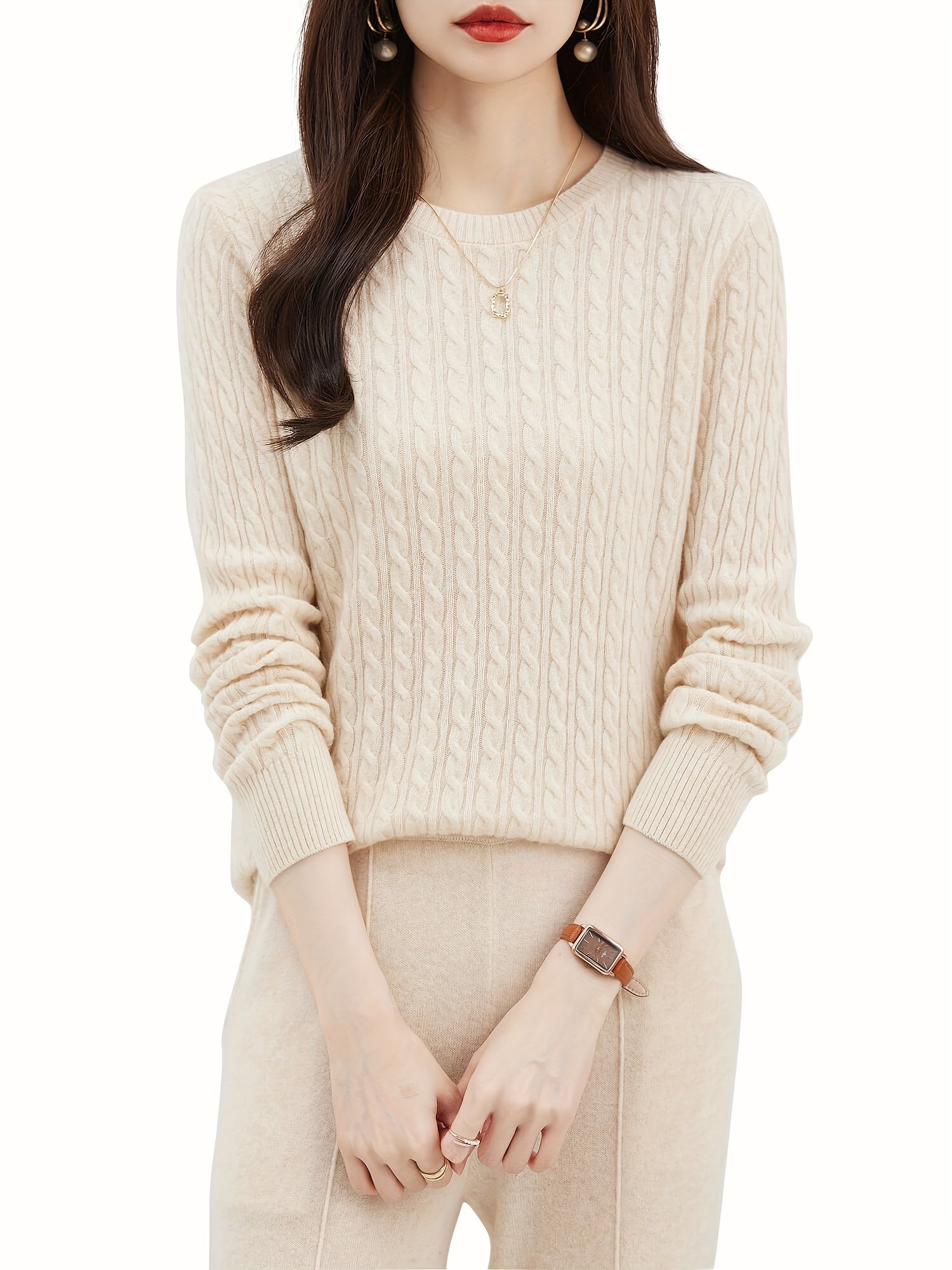 Cable knitted wool sweater with round neck