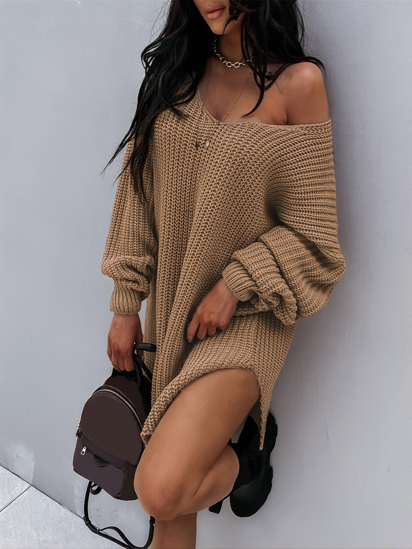 Knitted sweater with V-neck and lantern sleeves