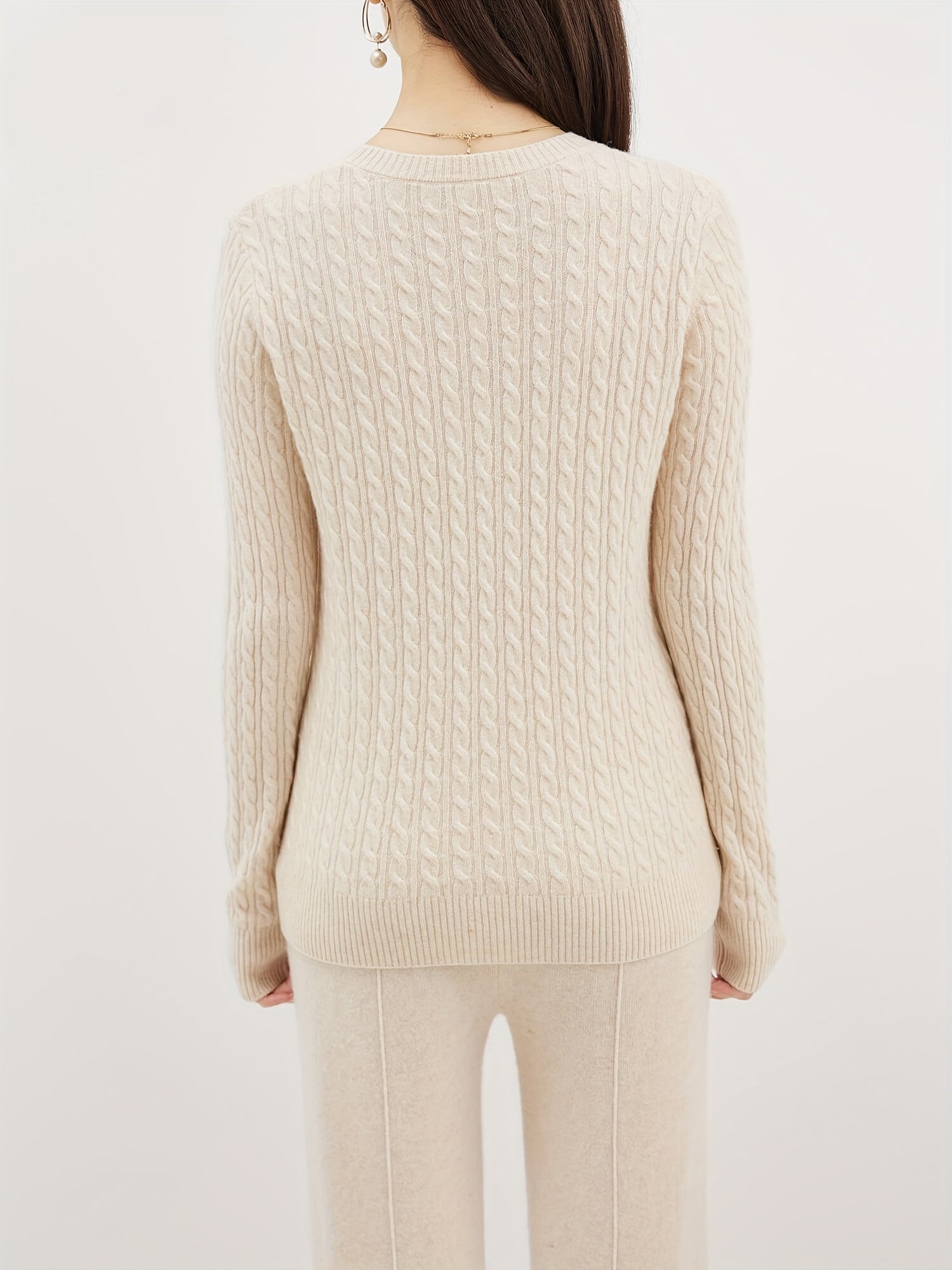 Cable knitted wool sweater with round neck