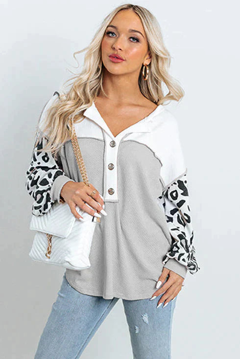 Patchwork waffle knit top with leopard sleeves