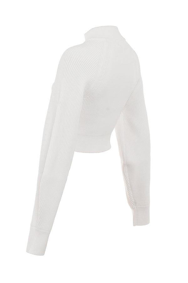 White ribbed sweater with balloon sleeves and cargo skirt