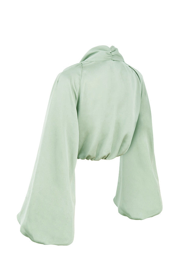 Deep-cut blouson top in silky satin with draped skirt