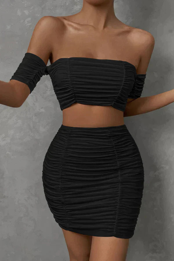 Elegant top and skirt with ruffles on the shoulders
