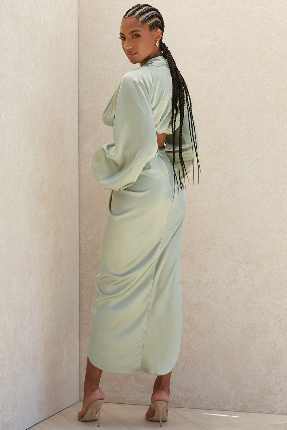 Deep-cut blouson top in silky satin with draped skirt