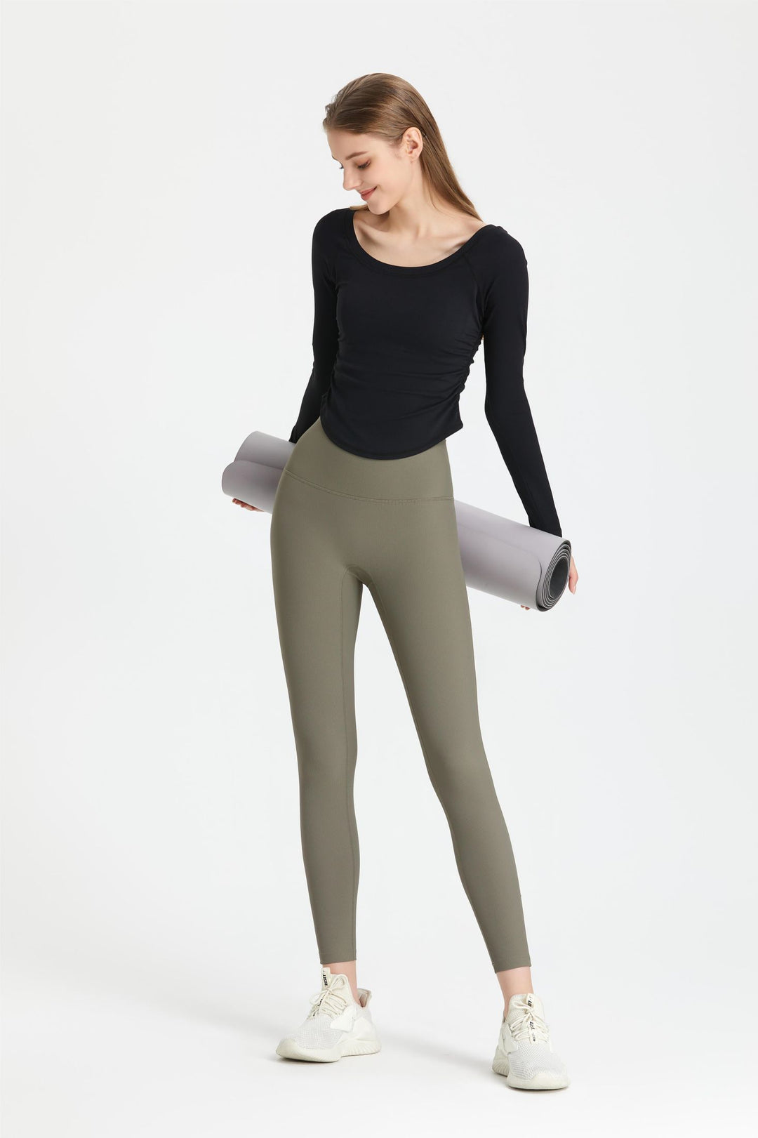 Top with long sleeves and ruffles on the sides