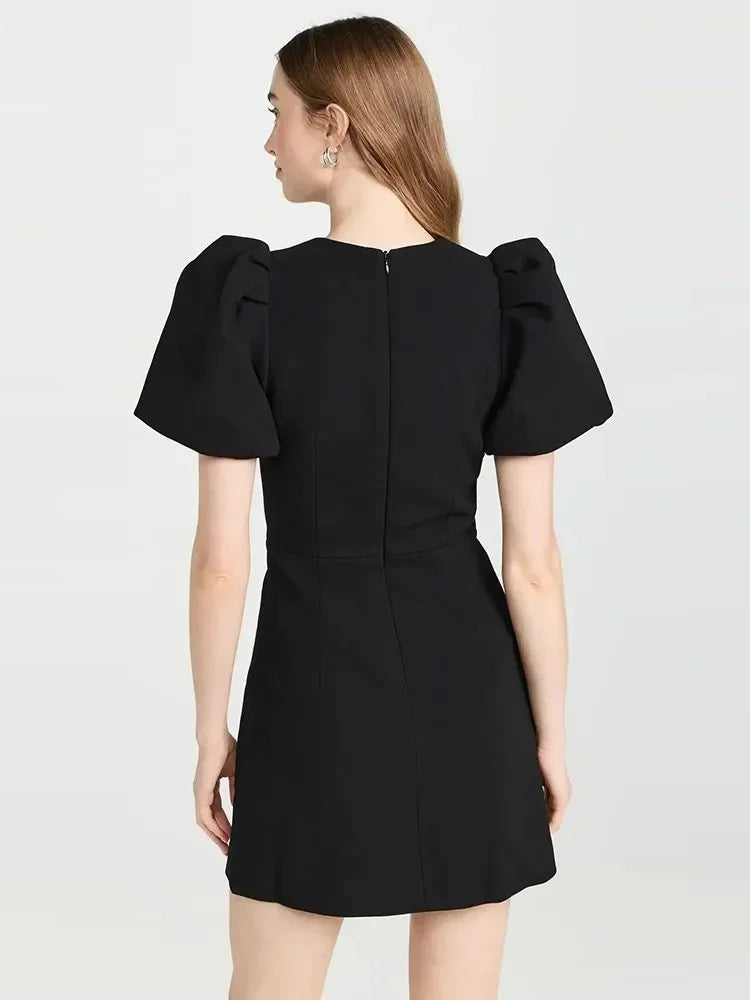 Black dress with three bows