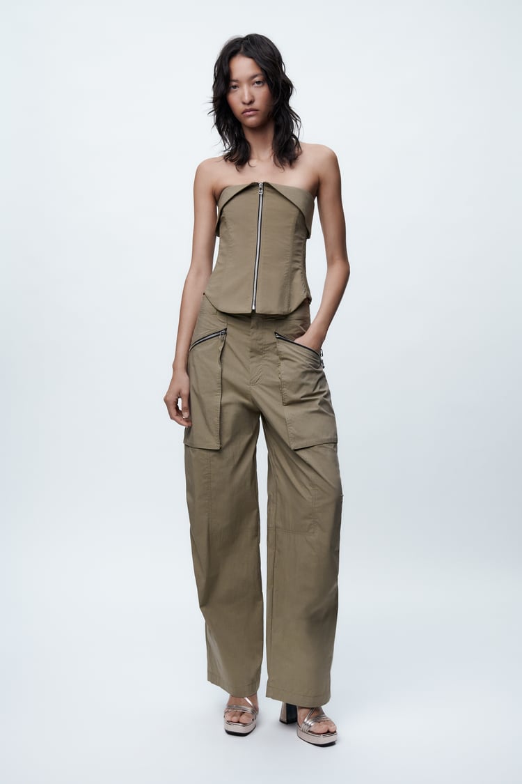 Zippered bustier and trousers in a set