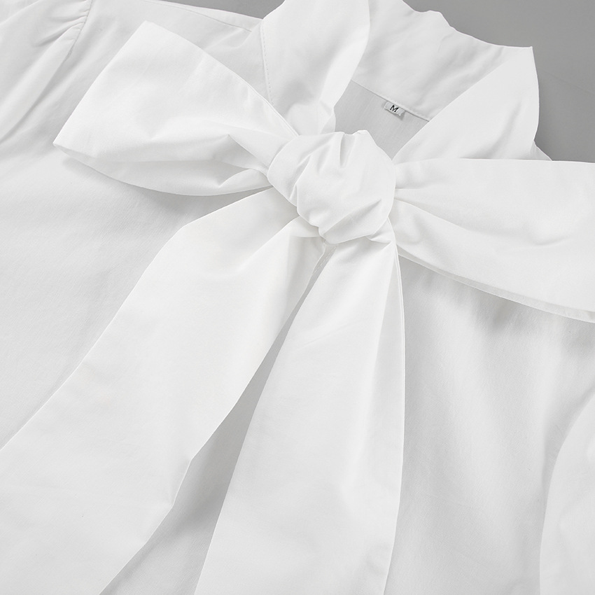 White shirt with bow