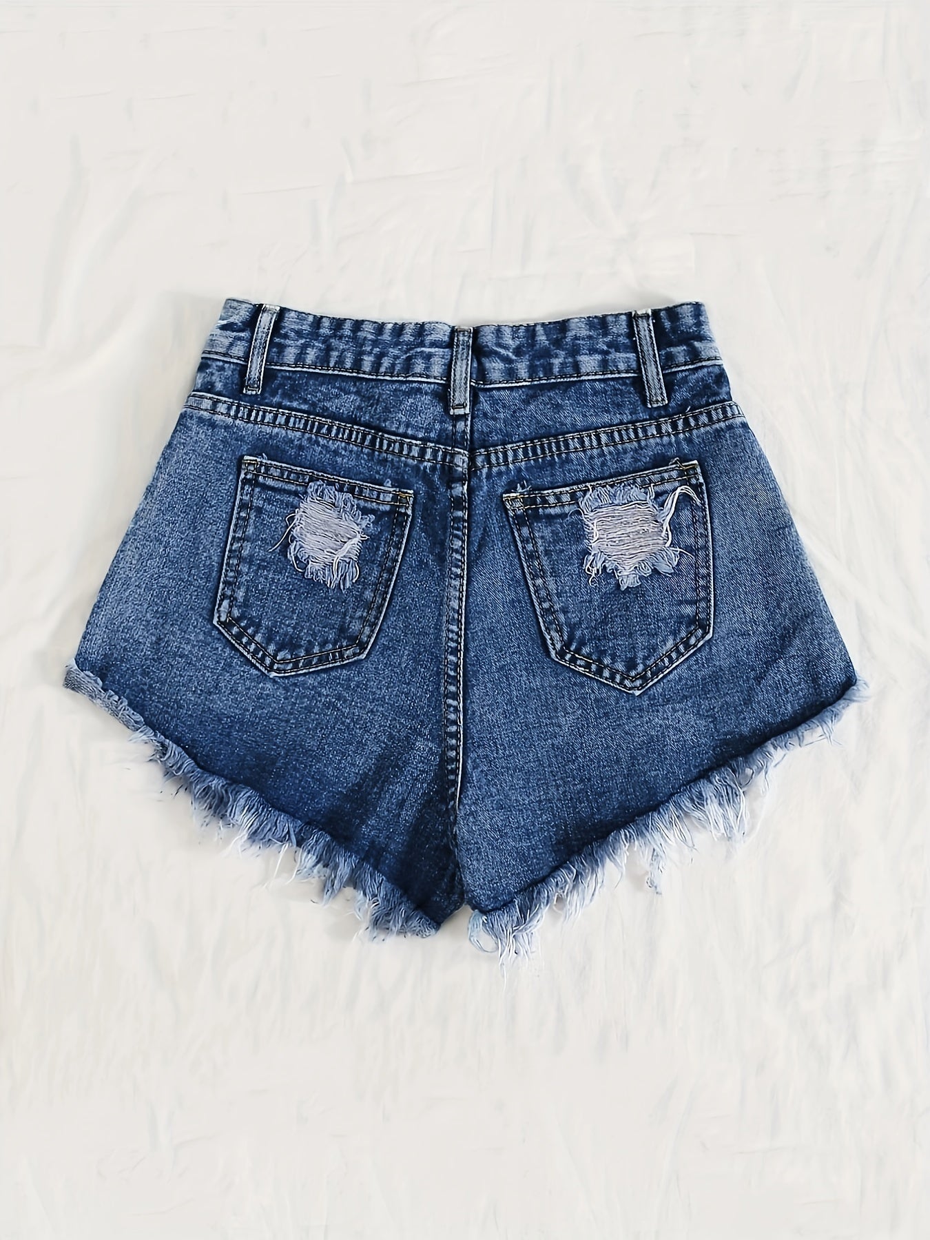 Sky blue denim shorts with frayed hem and tears