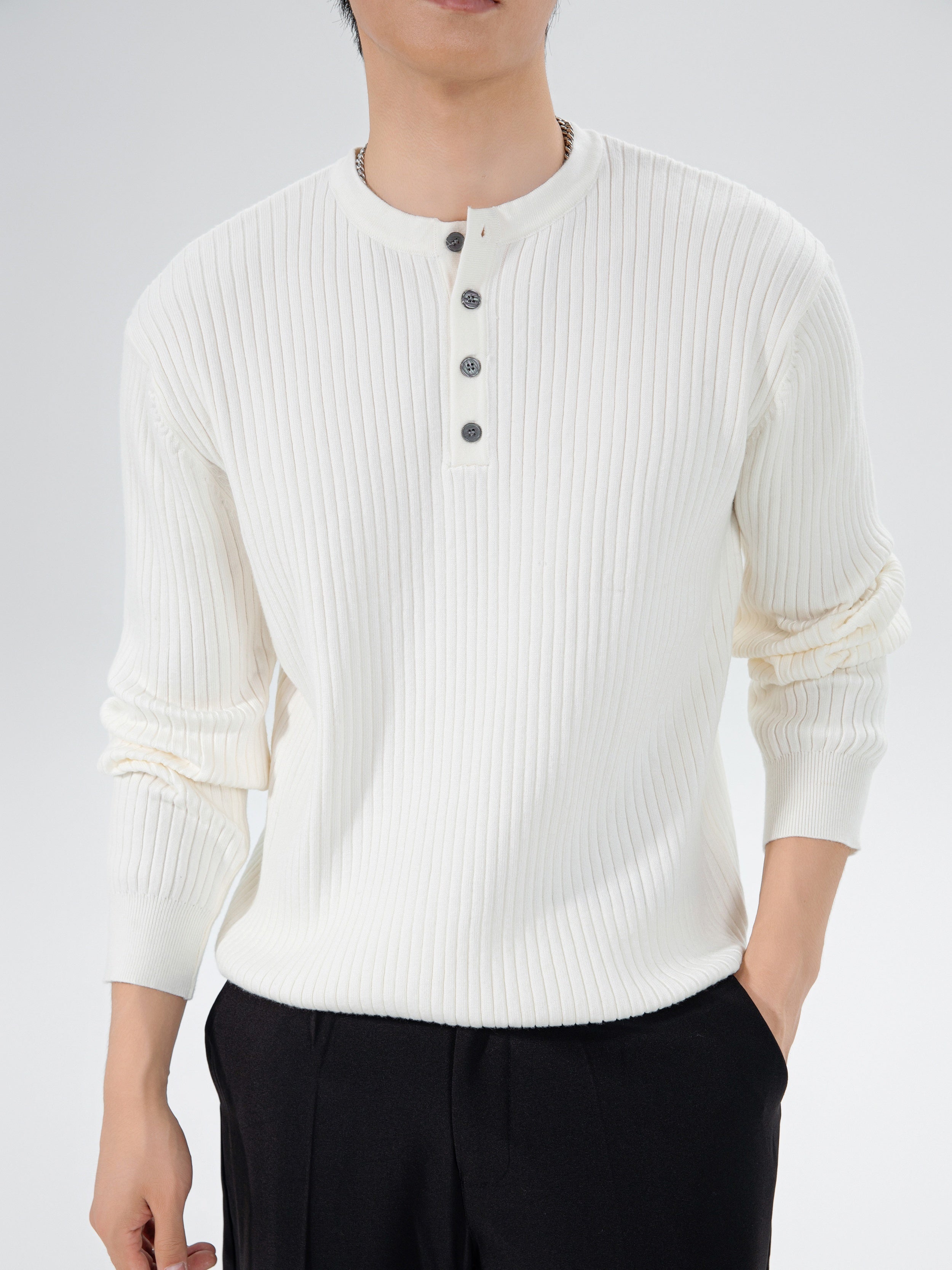 Striped white knitted sweater