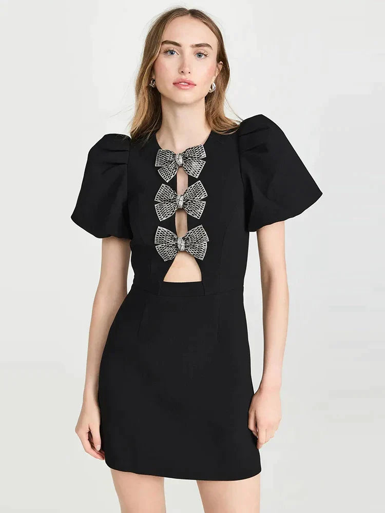 Black dress with three bows