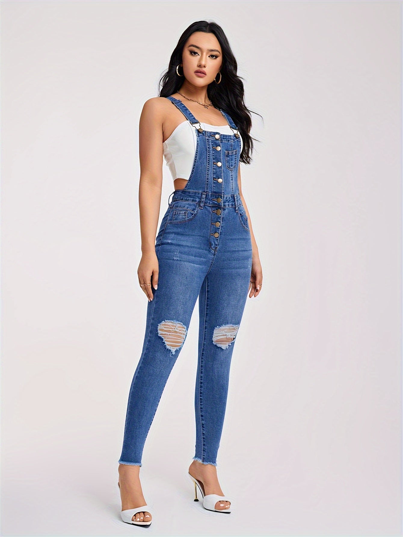 Torn denim overalls with half buttons