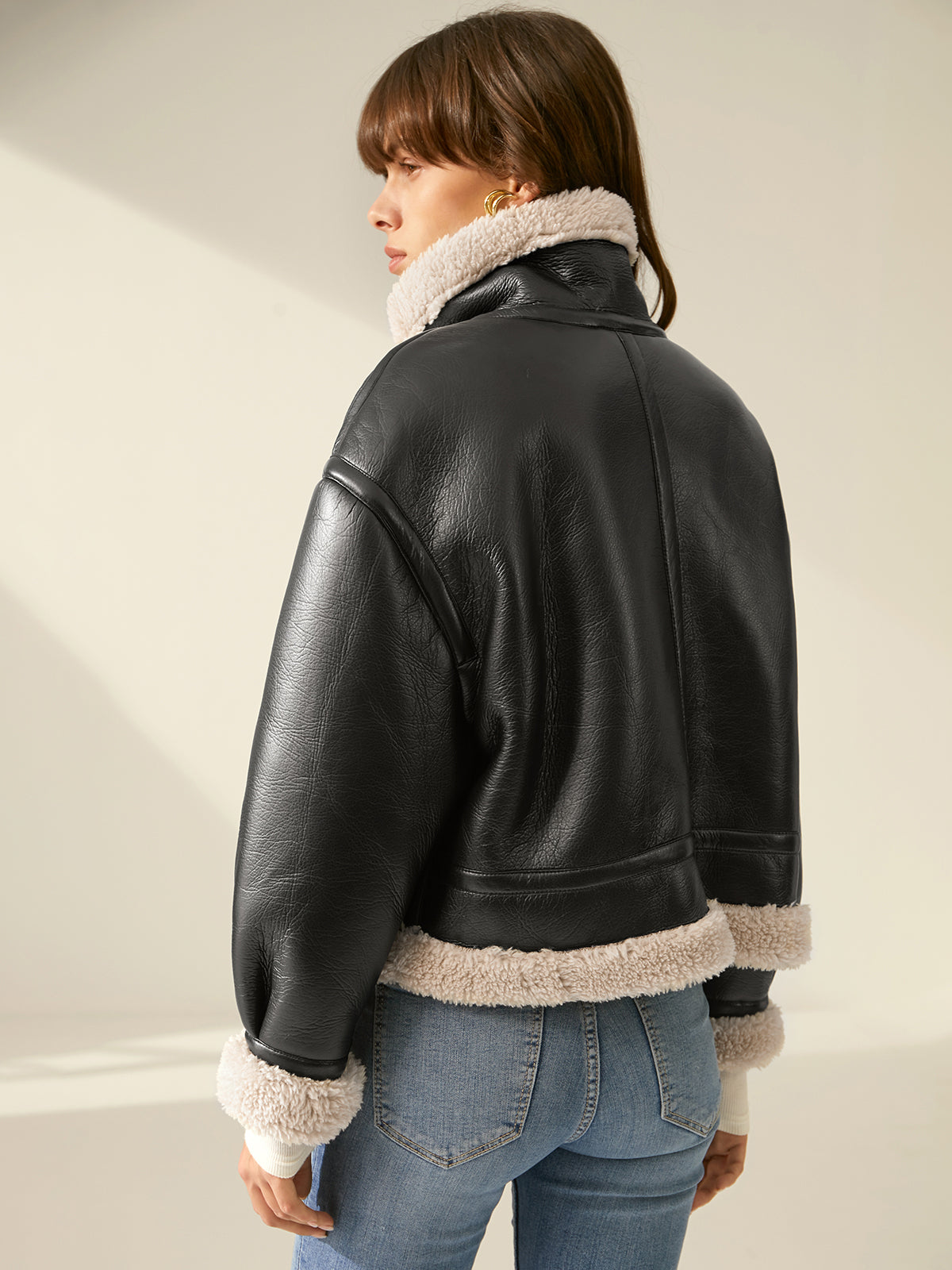 Leather jacket with fur for women