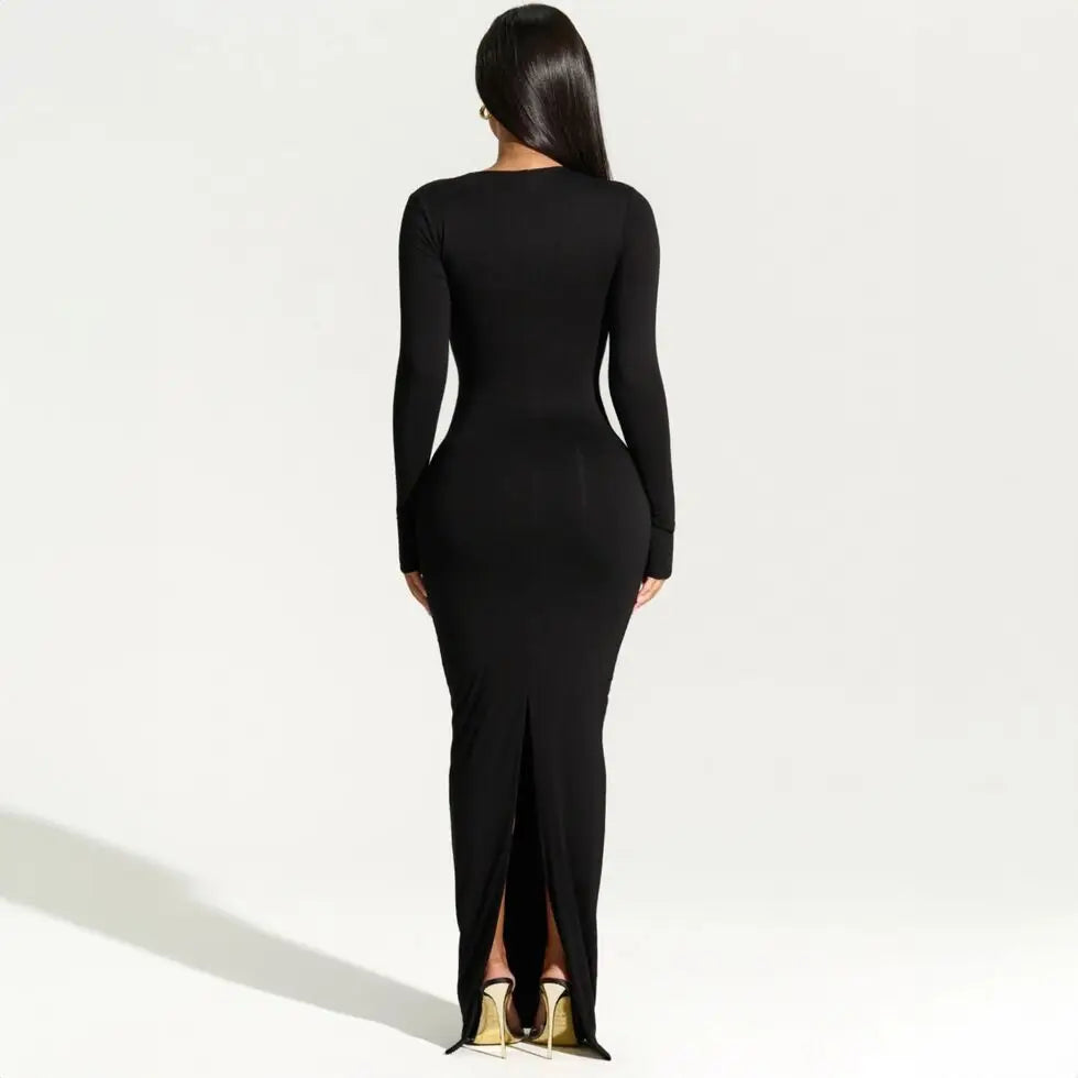 Slim black dress with long sleeves