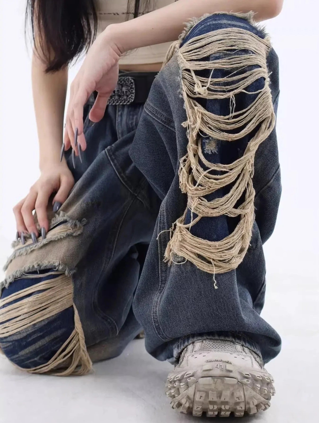 Ripped loose jeans