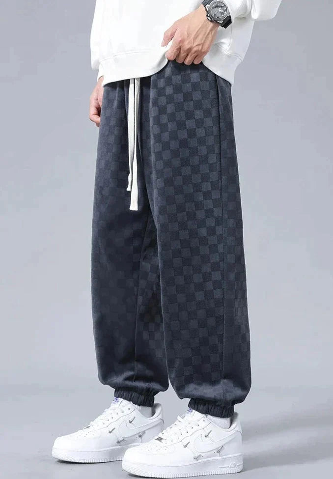 Wide sports pants with checkerboard pattern