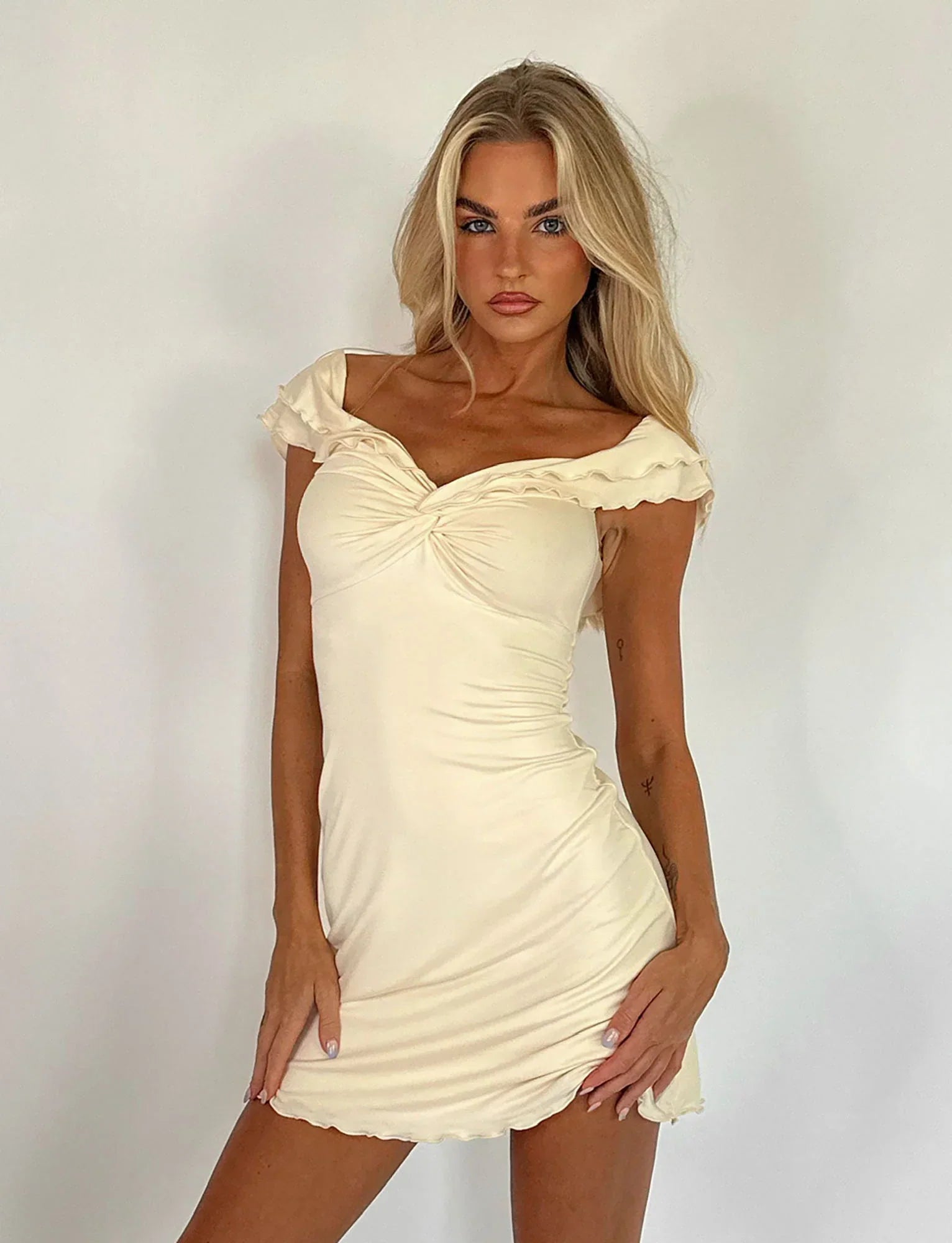 Twisted beige mini dress