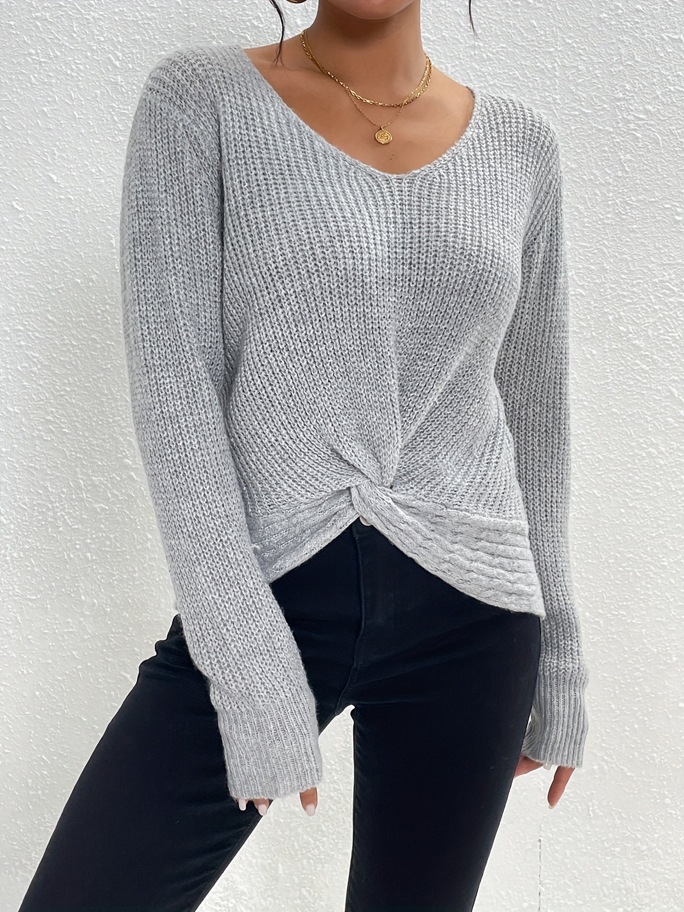 V-neck sweater with twisted front for women