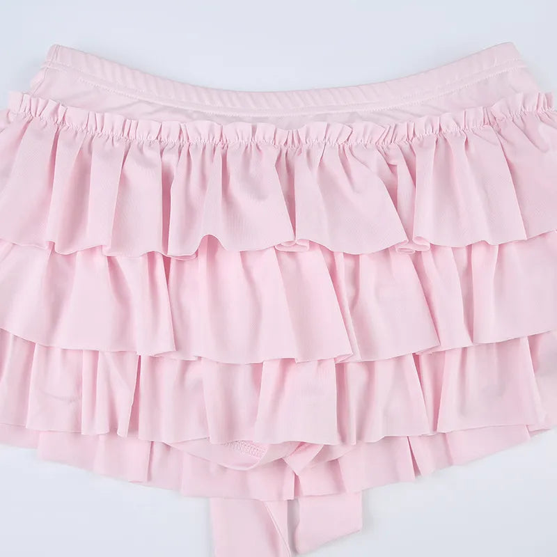 Bow Hip Mini Skirt In Light Pink