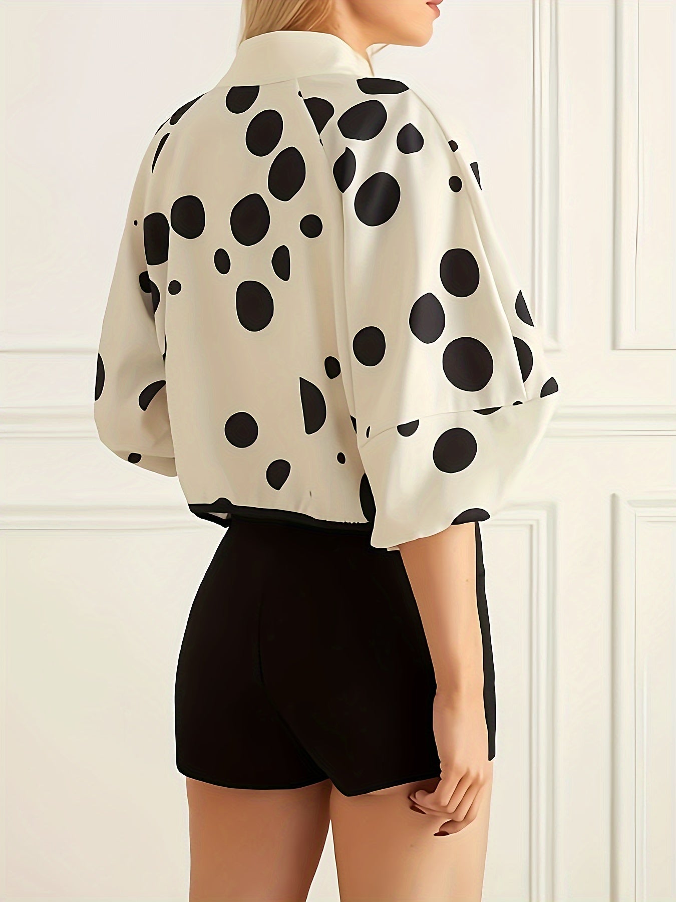 Zippered jacket with polka dot print