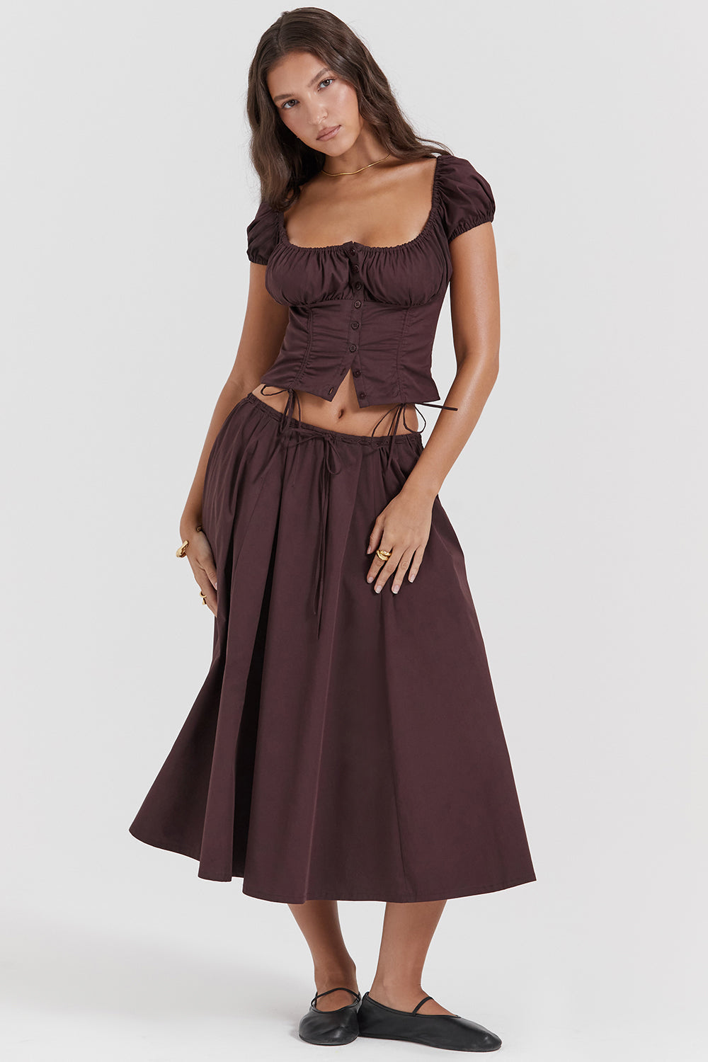 Top with ruffles in deep brown and midi skirt with ruffles