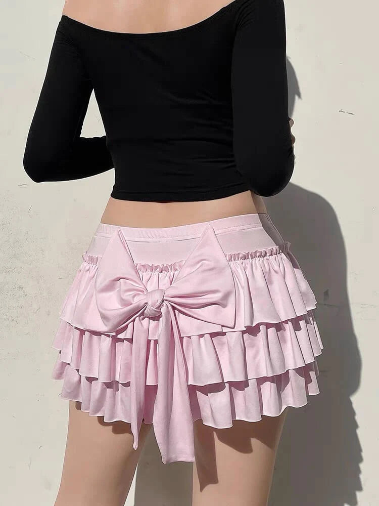 Bow Hip Mini Skirt In Light Pink