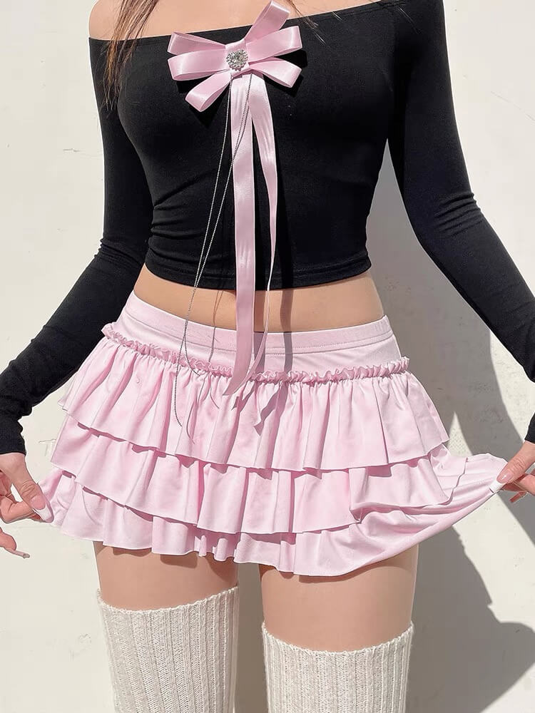 Bow Hip Mini Skirt In Light Pink