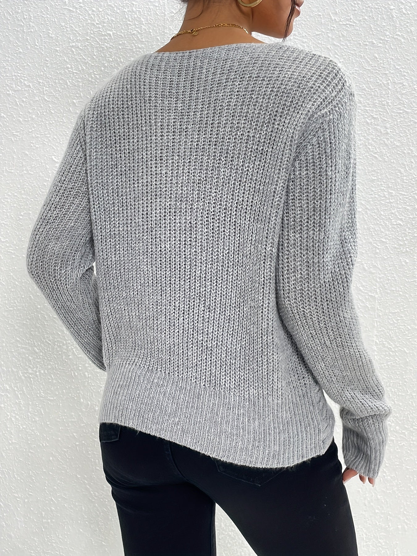 V-neck sweater with twisted front for women