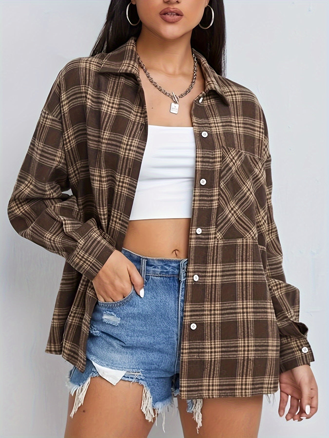 Checked shirt with button closure