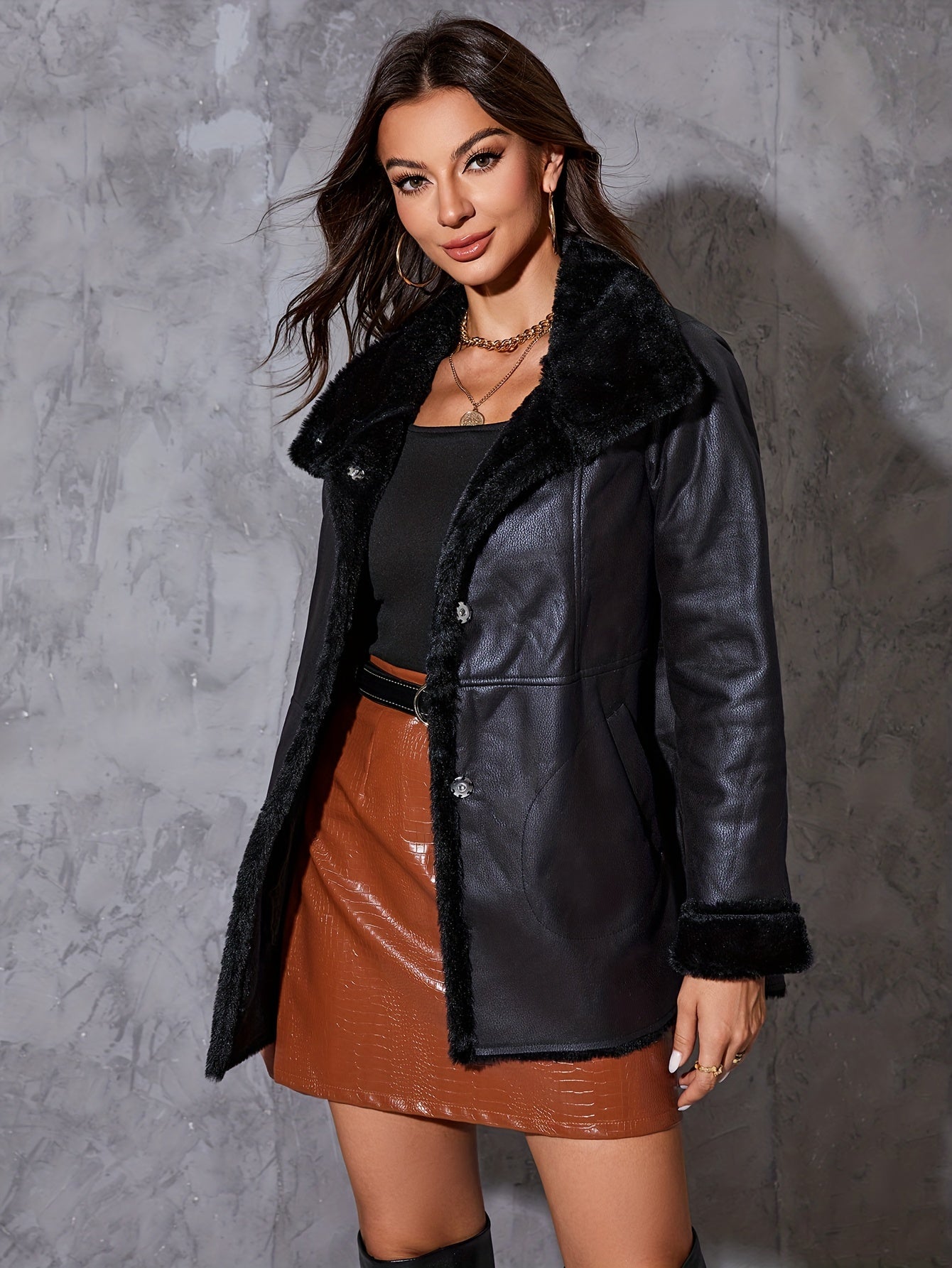 Leather jacket with fluffy trim