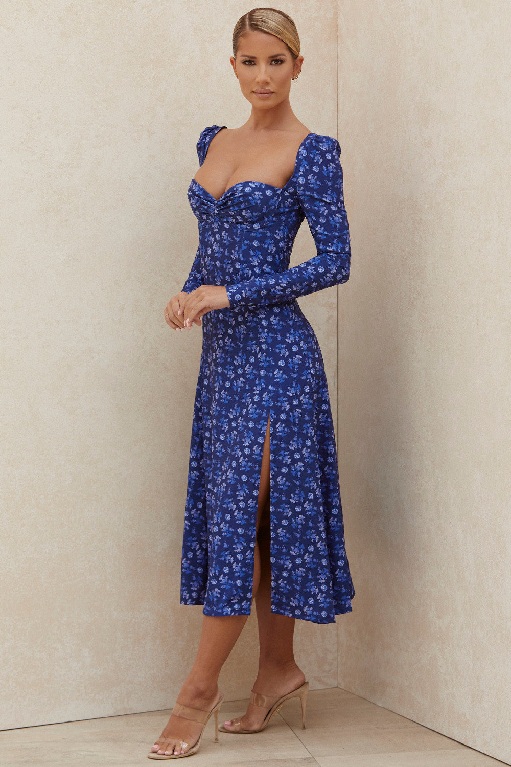 Sapphire colored midi dress with puff sleeves and flowers