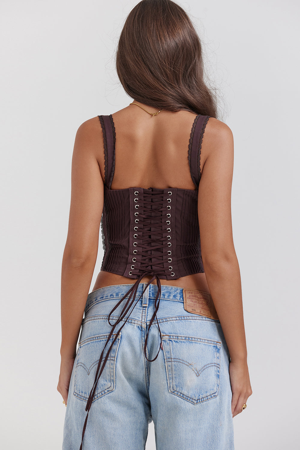 Rich brown lace corset on the back