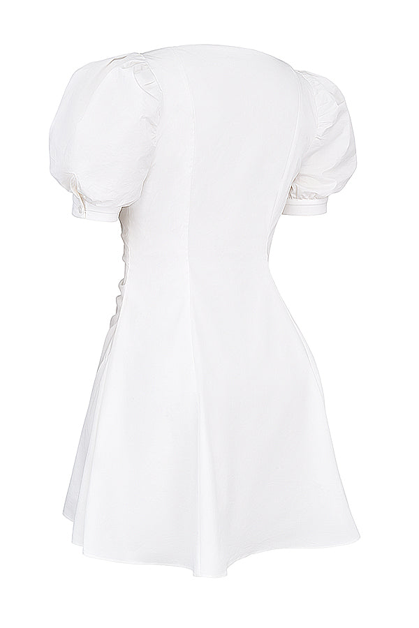 White mini dress with puff sleeves