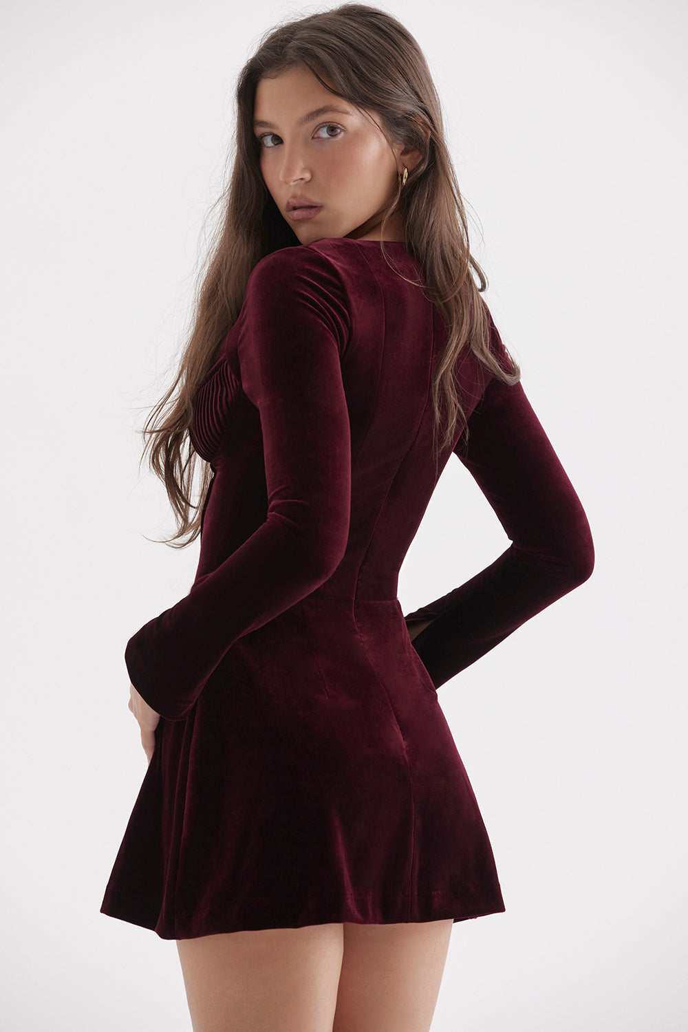 Black mini dress with cherry-colored pleats