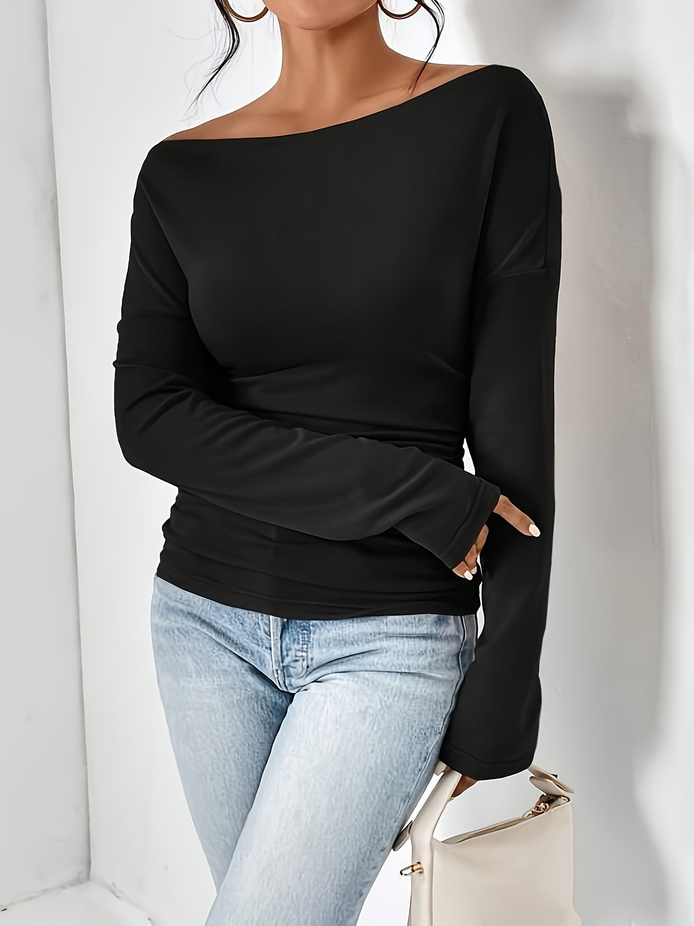 T-shirt with asymmetrical neckline and ruffles