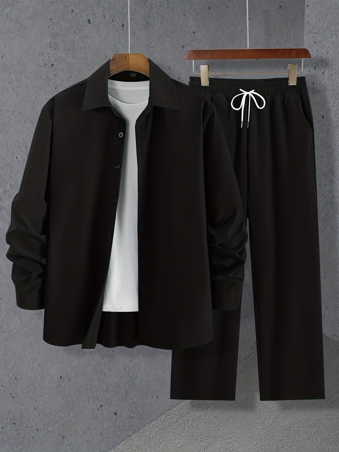 Simple set consisting of a long-sleeved shirt and drawstring trousers for summer