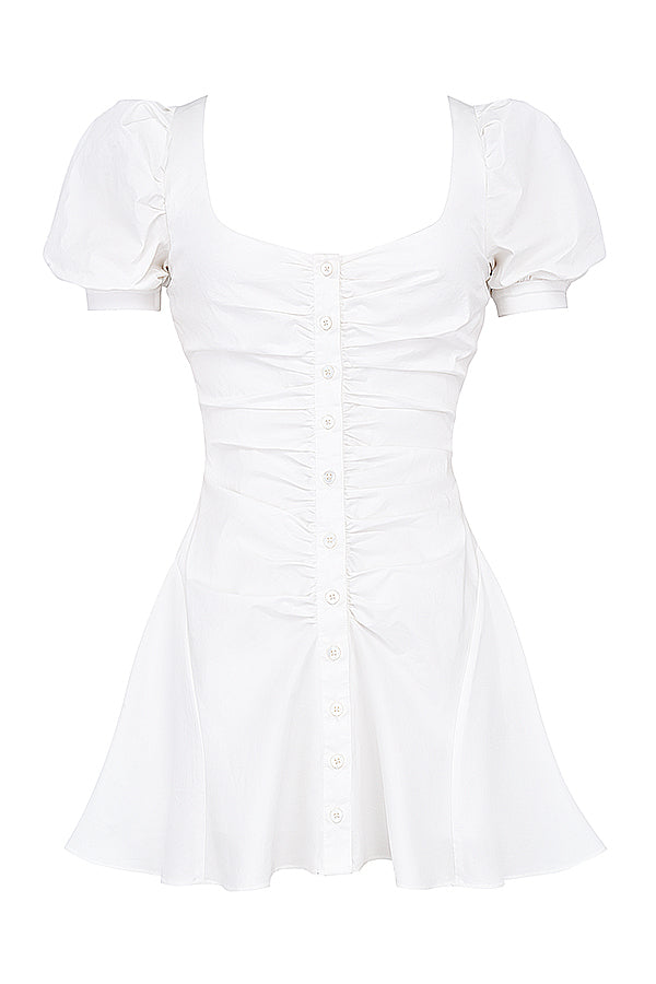 White mini dress with puff sleeves