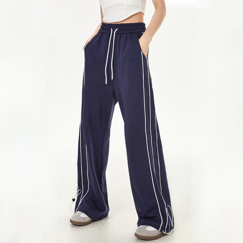 Loose sports pants with a high waist and straight legs