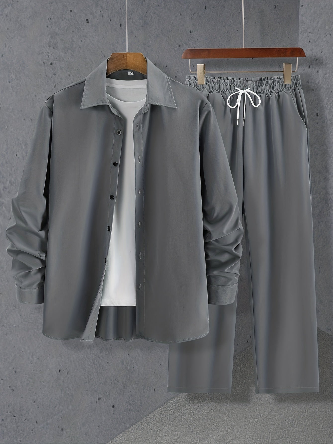 Simple set consisting of a long-sleeved shirt and drawstring trousers for summer