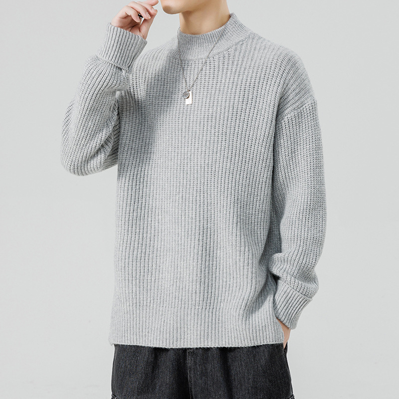 Knitted sweater with high collar