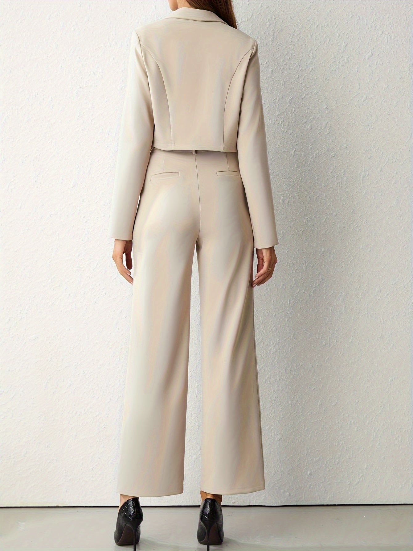 Elegant beige lapel blazer and straight leg trousers