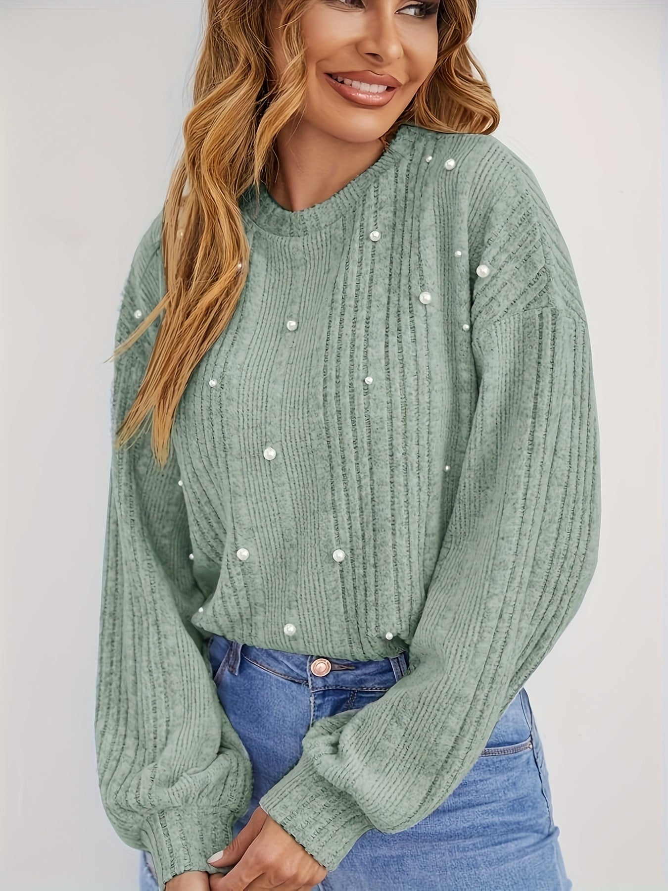 Ribbed sweater with round neck and pearl decoration